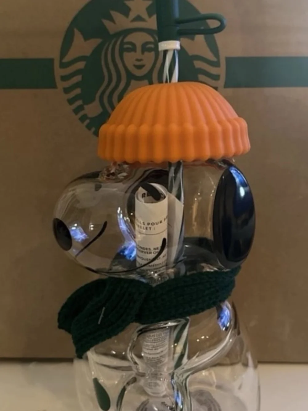 Starbucks Clear Glass Peanuts Snowman Cup with Orange Lid and Green Scarf